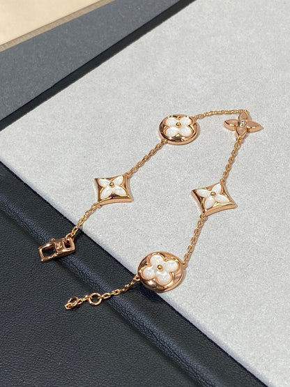 [Renovia Jewelry]STAR AND SUN 5 MOTIF MOP PINK GOLD BRACELET
