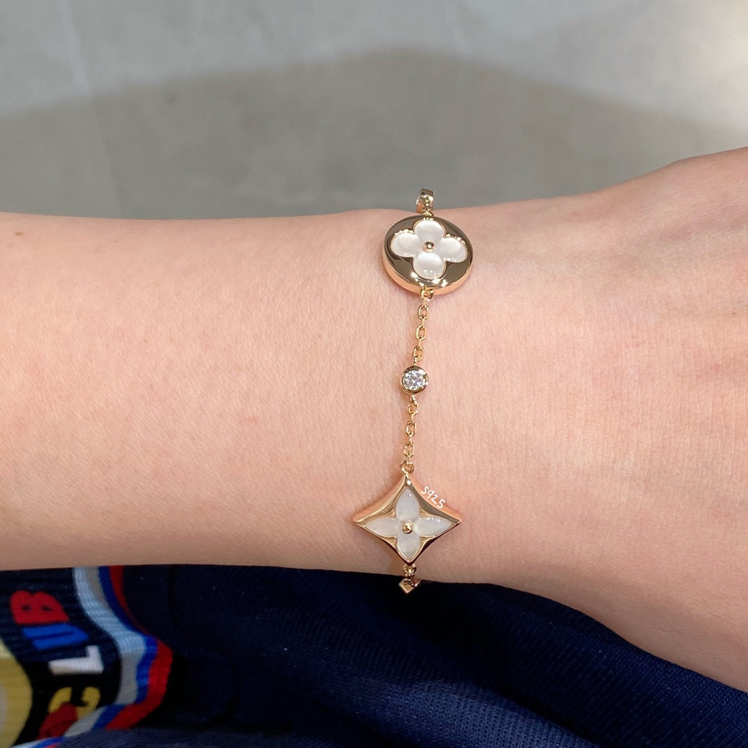 [Renovia Jewelry]STAR AND SUN 4 MOTIF WHITE MOP PINK GOLD BRACELET